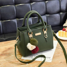 Black Women's Fashion Handbag with Pom Pom Charm